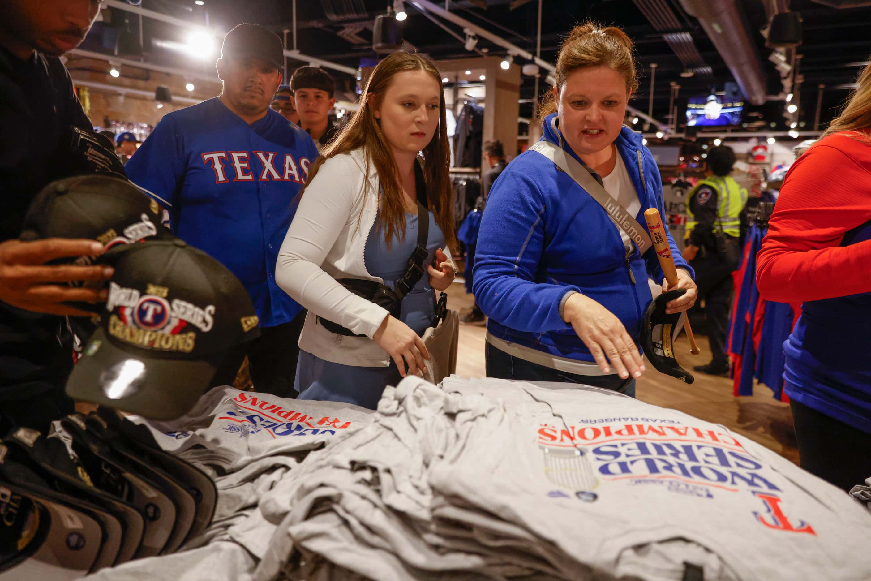 Texas Rangers fans go through the Grand Slam store following Texas Rangers’ winning the...
