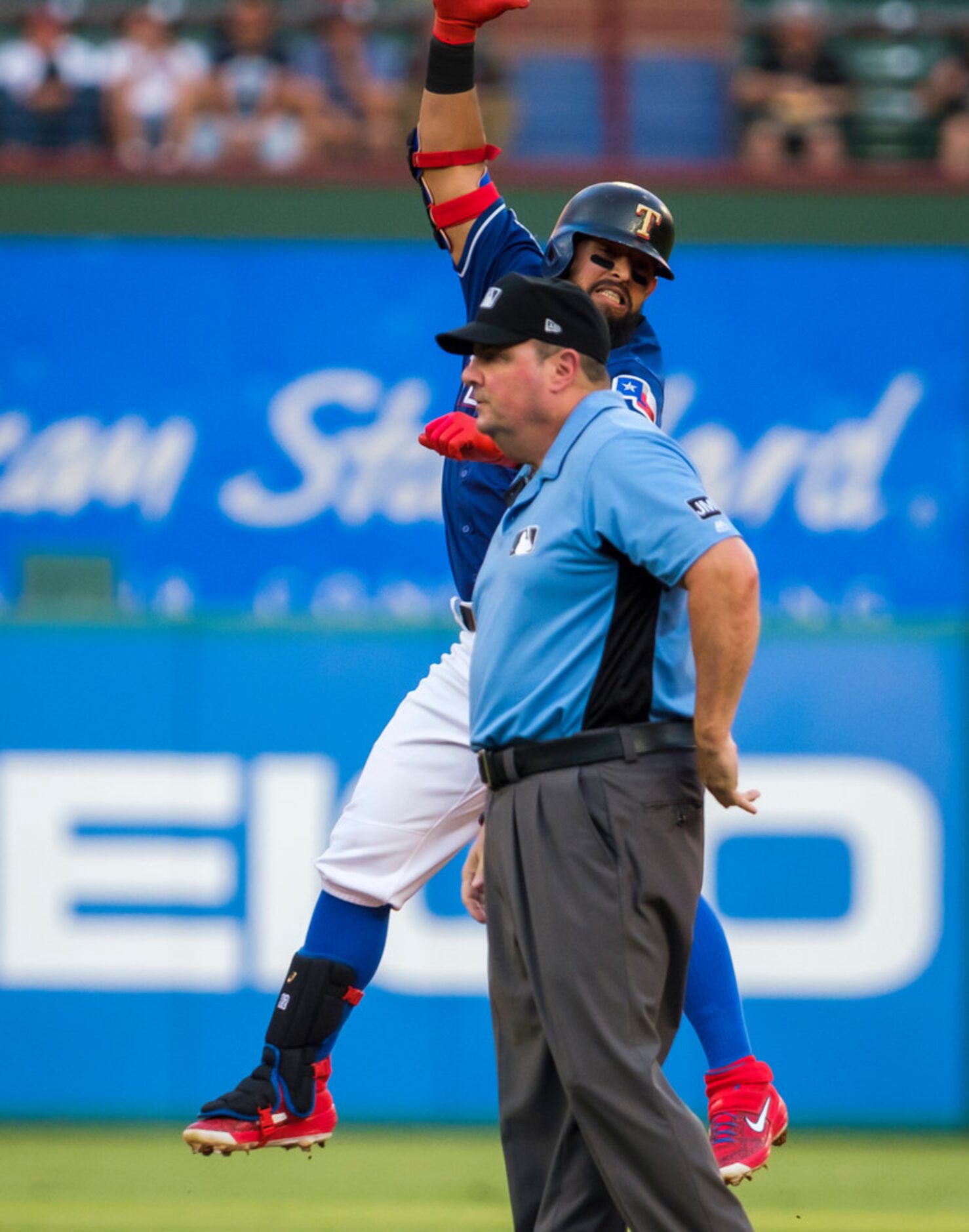 Texas Rangers second baseman Rougned Odor celebrates after hitting an RBI double during the...