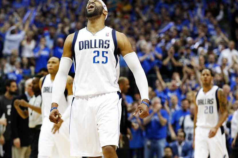 Dallas Mavericks guard Vince Carter (25) shows his emotion as he and his teammates go up on...