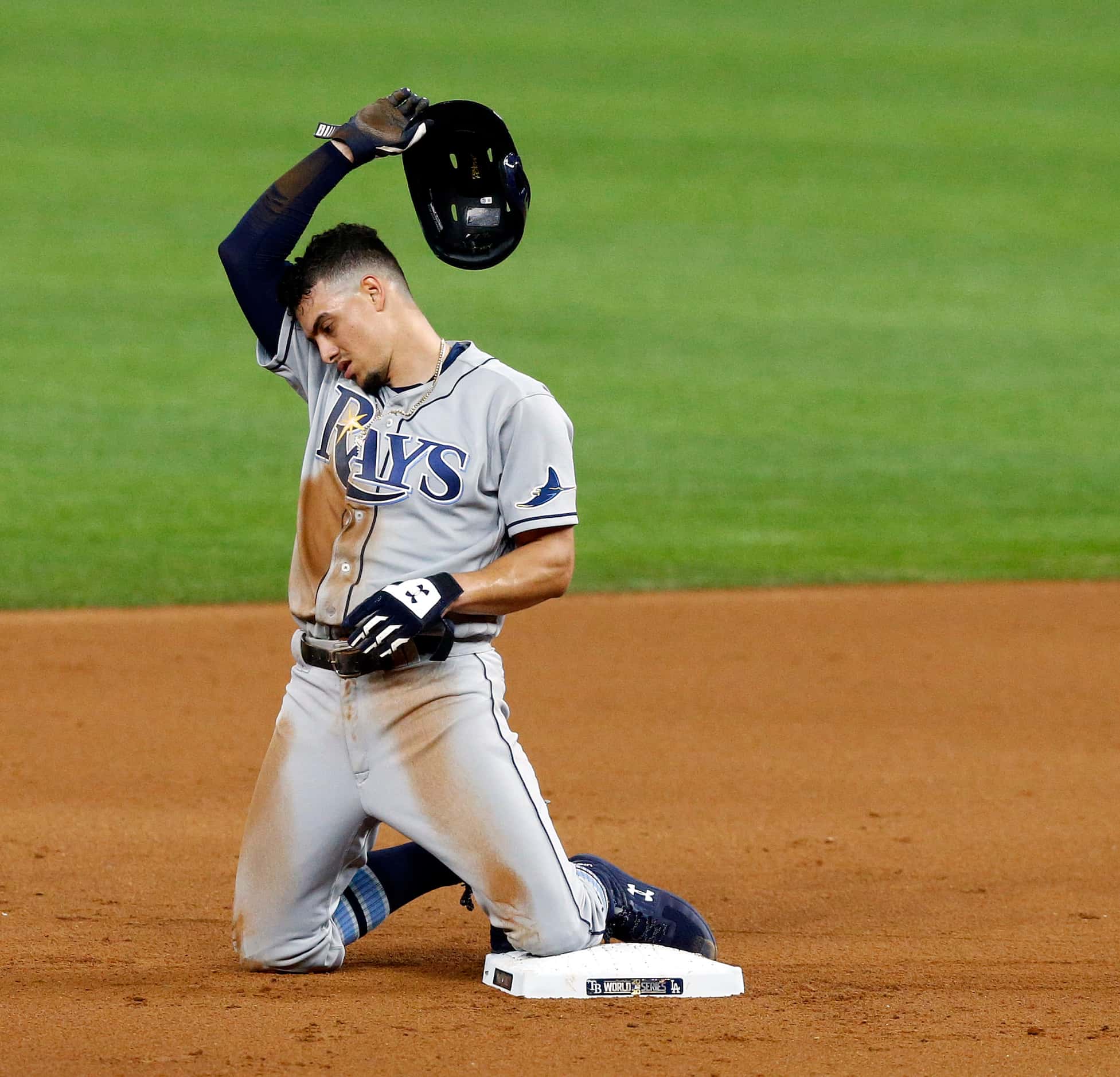 Tampa Bay Rays Willy Adames (1) reacts after he was caught stealing by Los Angeles Dodgers...