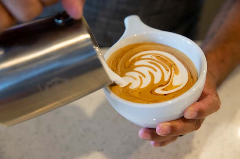 Angelo Europe makes a Micah Mocha at Grounds & Gold Coffee Co. on Sept. 14, 2020 in Arlington. 