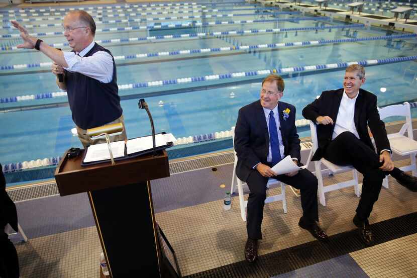 David Kuykendall (left) speaks during a dedication ceremony for Frisco ISD's natatorium....
