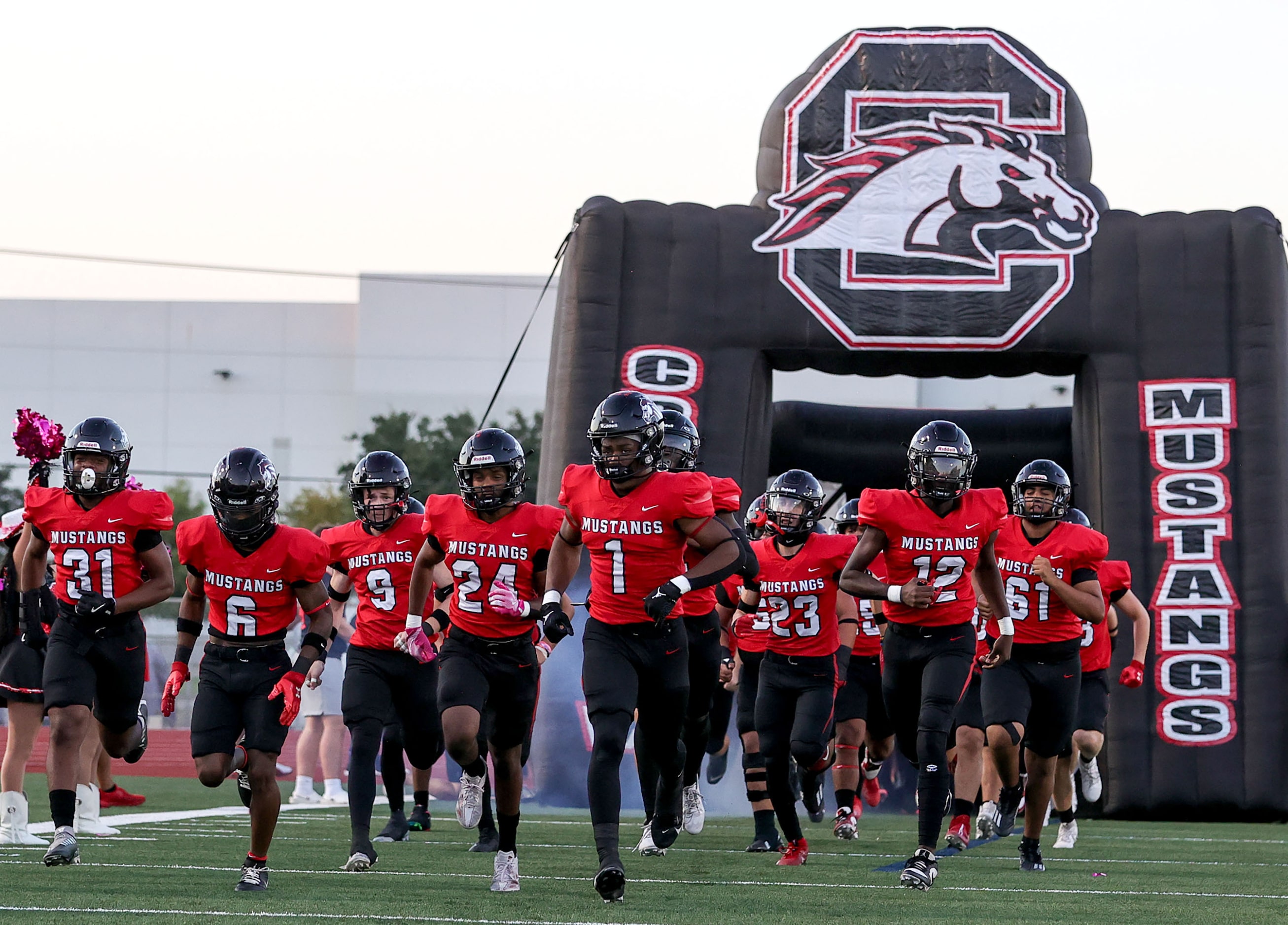 The Creekview Mustangs enter the field to face W.T. White in a District 6-5A Division I high...