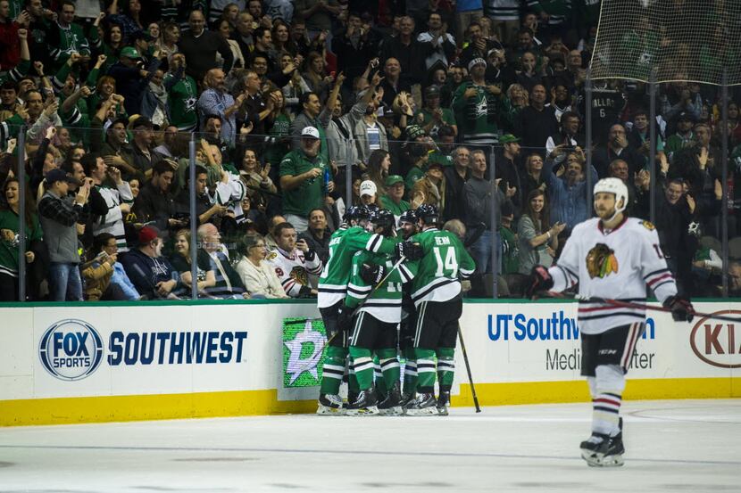 The Dallas Stars celebrate a goal during the second period of their game on Tuesday,...