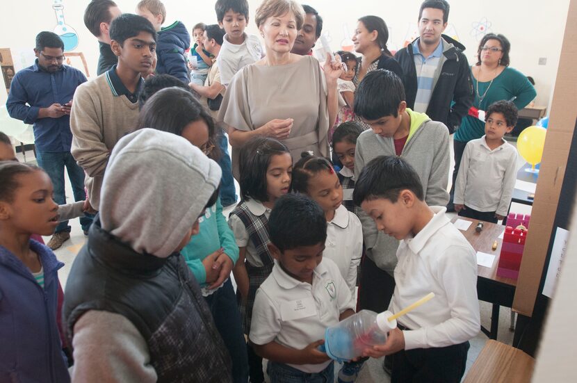 Jonathan Vasquez, right, describes his science project on the human lung during the...