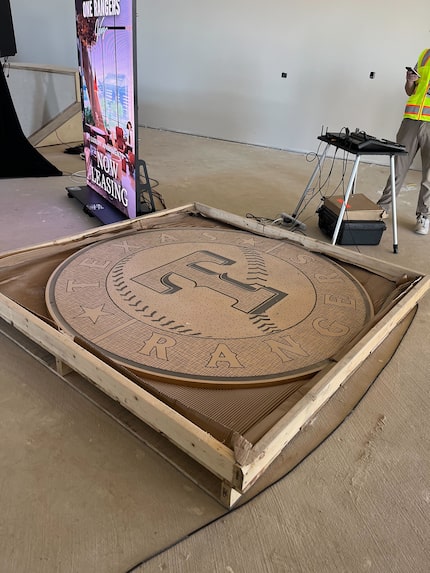 An engraved Texas Rangers emblem which will be inlaid on the first floor of One Rangers Way,...