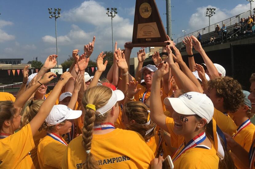 Highland Park players celebrate winning the Class 5A state championship in team tennis on...