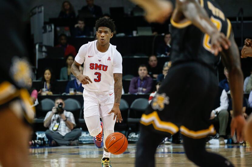 FILE - SMU guard Kendric Davis (3) waits for the offense to set during the first half of a...