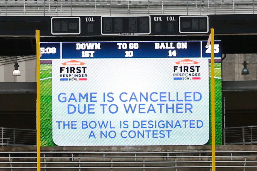 after the game was cancelled due to weather  at the Servpro First Responder Bowl at Cotton...