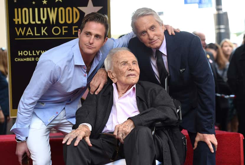 When Michael Douglas (right) was honored with a star on the Hollywood Walk of Fame on Nov....