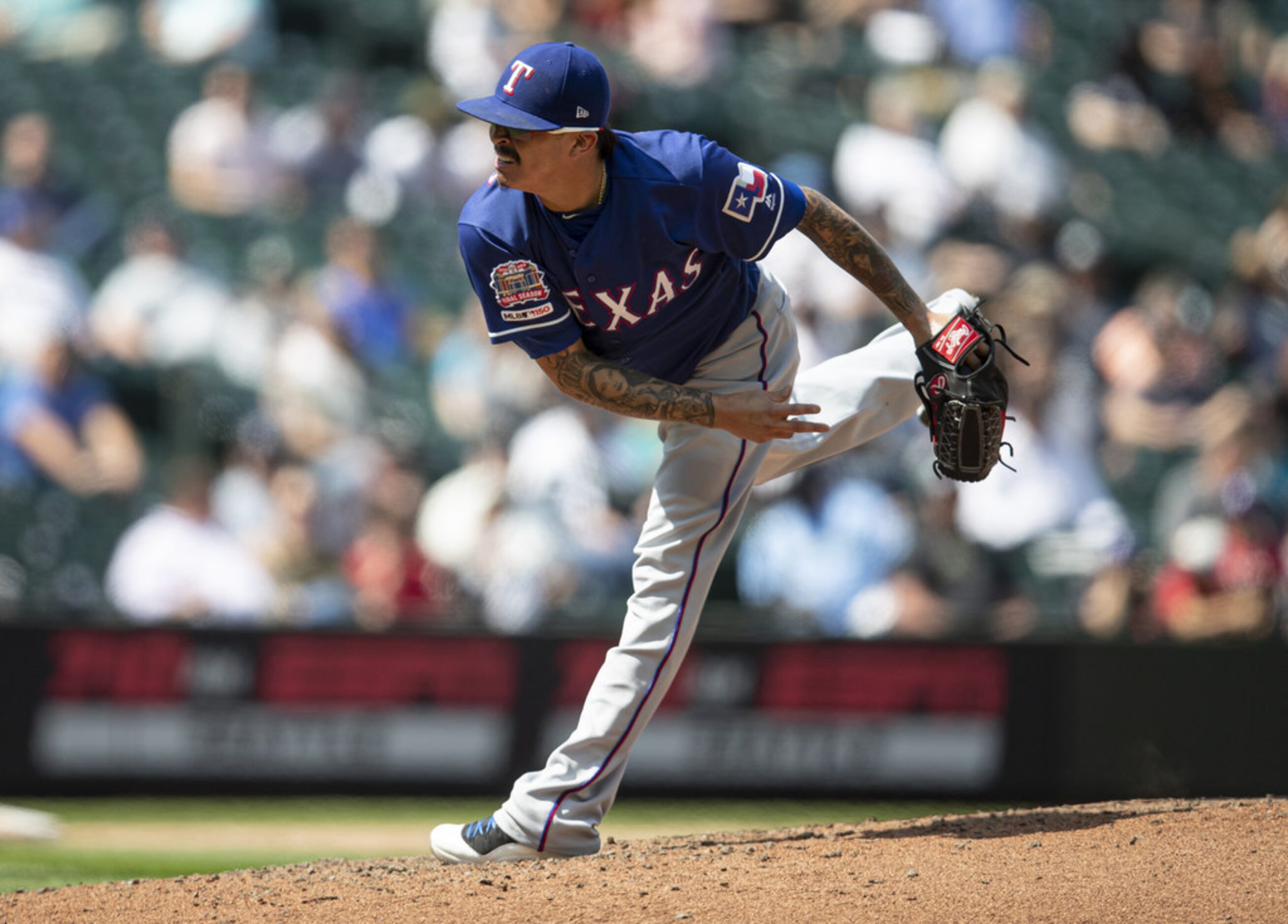 SEATTLE, WA - MAY 29: Reliever Jesse Chavez #53 of the Texas Rangers delivers a ptich during...