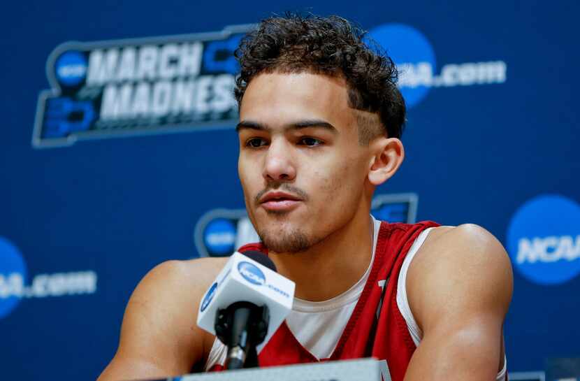 FILE - In this March 13, 2018, file photo, Oklahoma's Trae Young answers questions during a...