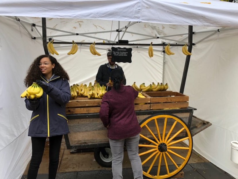 "Amazonians" giving away free bananas from the daily banana stand.