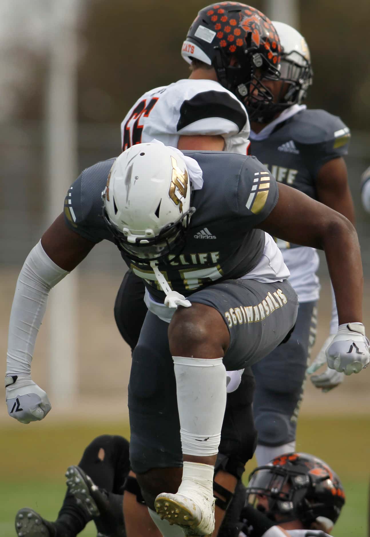 South Oak Cliff defensive lineman Keith Smith (80) celebrates a defensive stop during second...