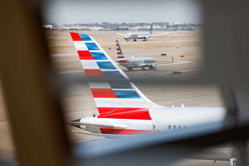 American Airlines planes on the ramp in Terminal D at DFW Airport on Tuesday, March 1, 2022.