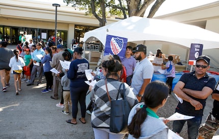 People wait in line to take advantage of a f