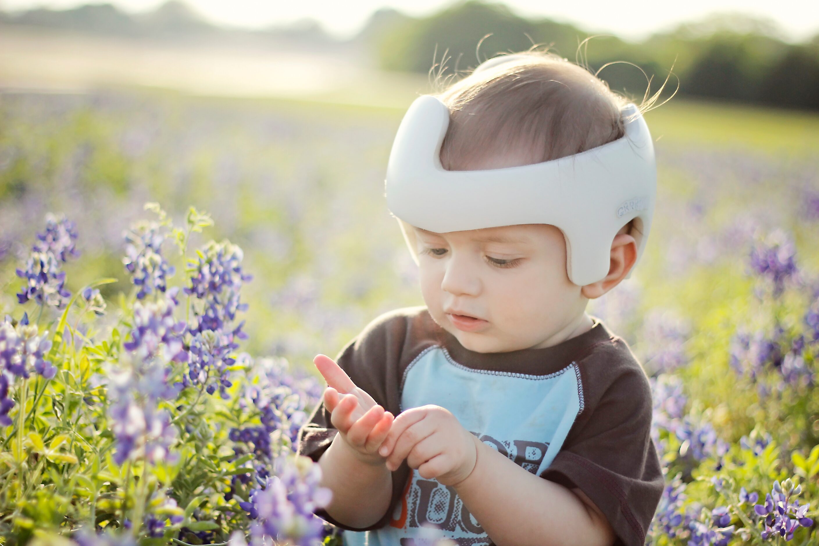 Sasha Zaikowski captures her son, Legend, examinging blue bonnets for the first time in her...