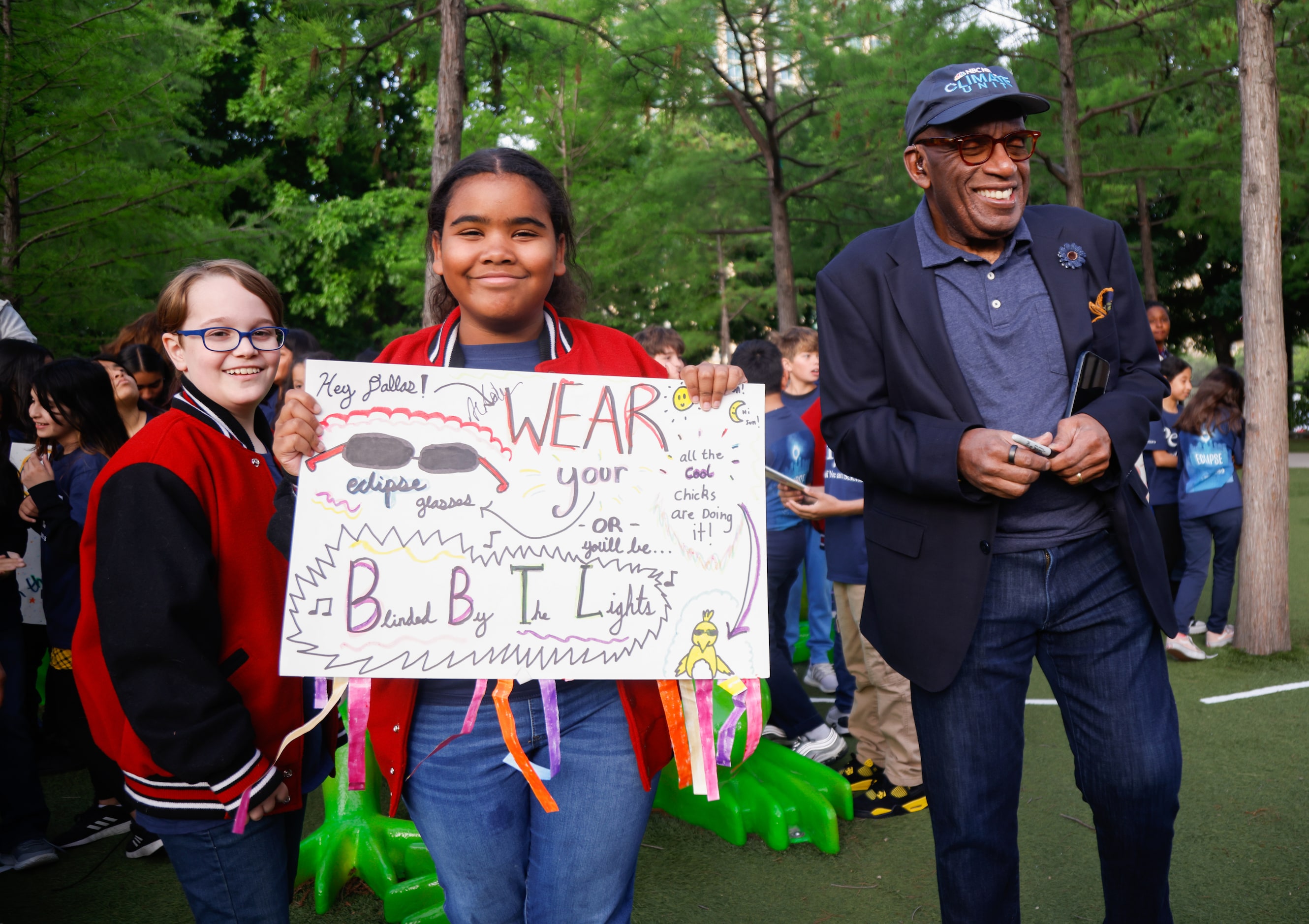 (From left) Lamplighter School students Drew Berry, 10, and Sarah Adkins, 10, react after...