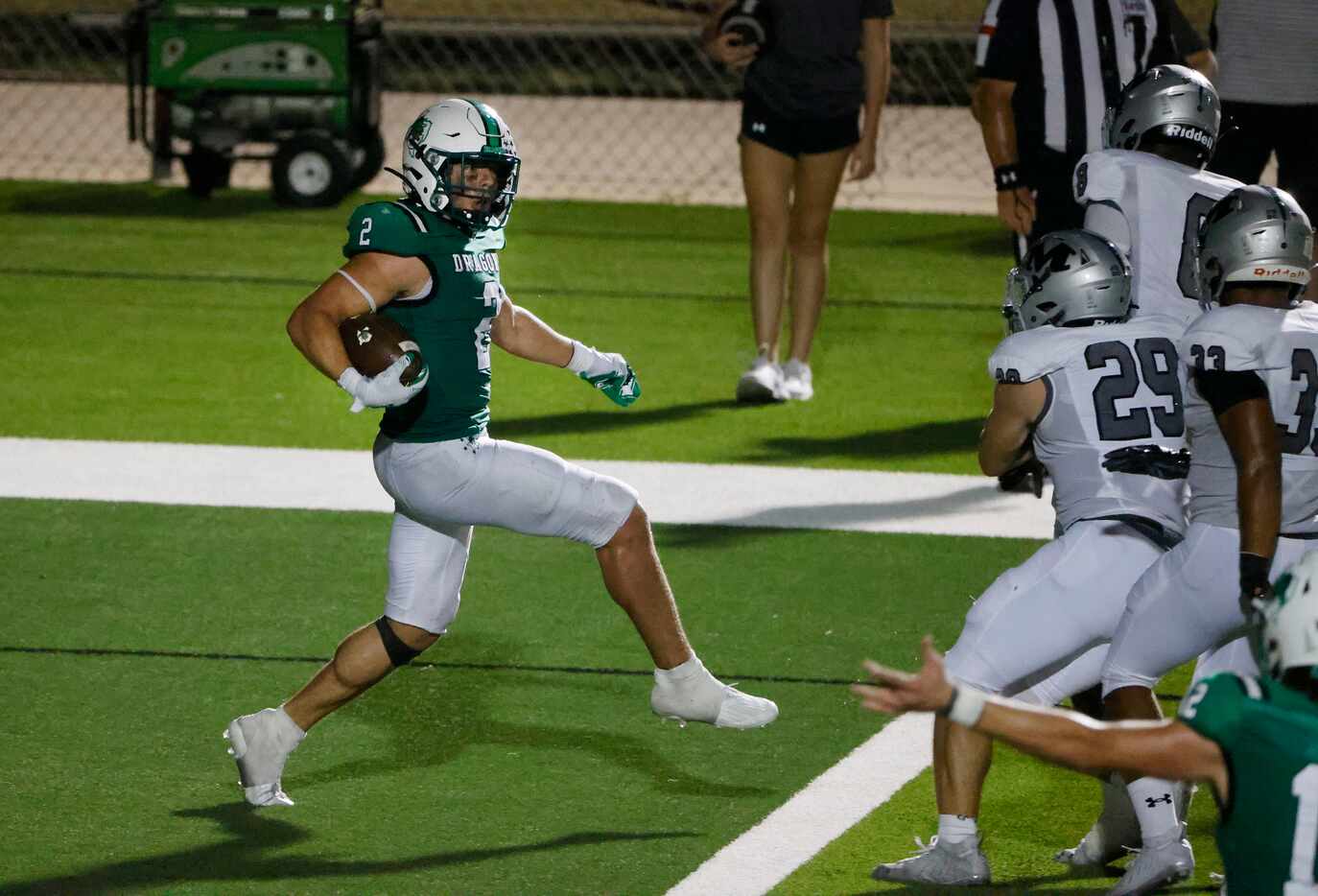 Southlake Carroll running back Owen Allen  (2) backs into the end zone for his second...