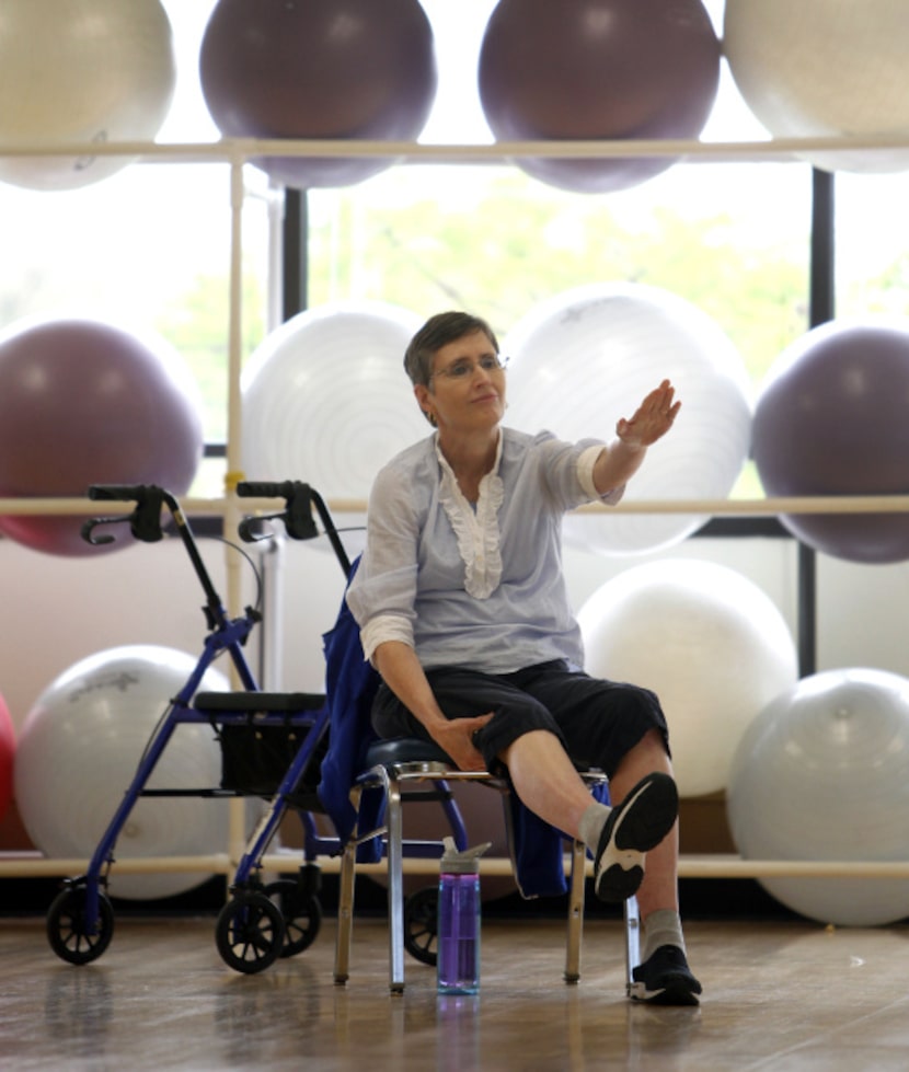 Beth Stehling takes part in the class, which serves patients with Parkinson,'s multiple...