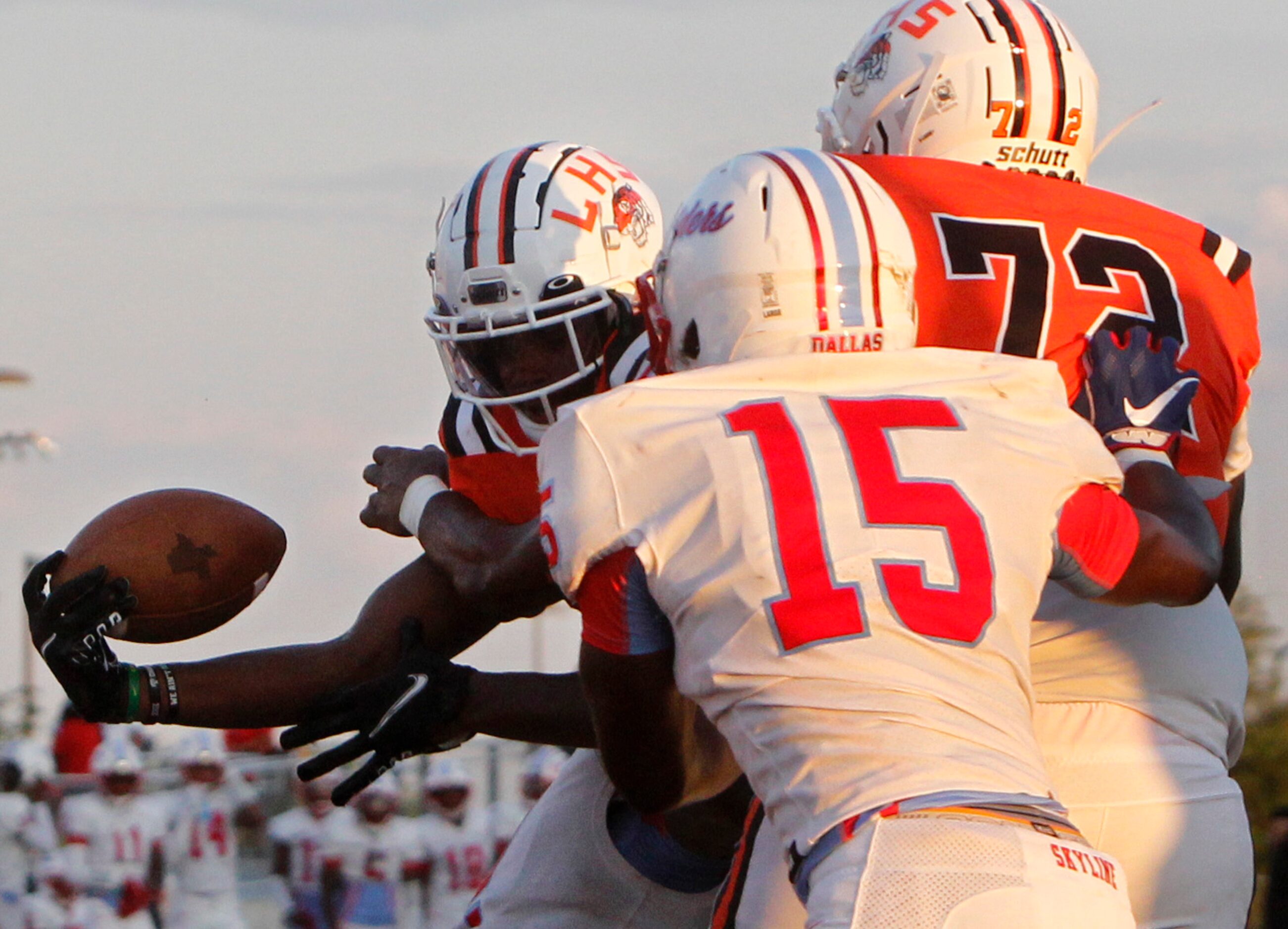 Lancaster running back Kewan Lacy (2), left, stretches the ball across the goalie for a...