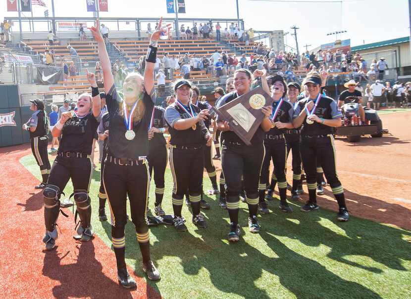 Forney girls celebrate after their win over Richmond Foster at their 5A UIL softball state...