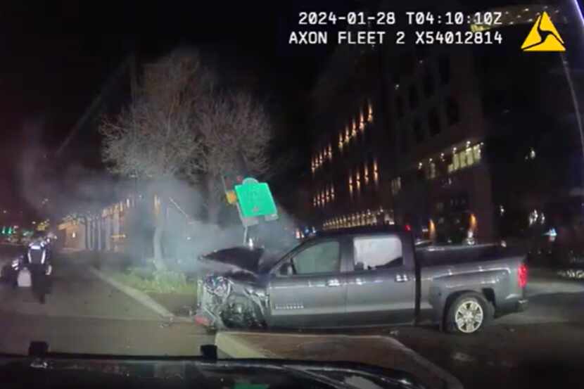 A screenshot of dash camera footage shows a crashed truck allegedly driven by a drunk driver...