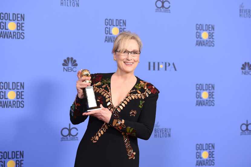 Actress Meryl Streep poses with The Cecil B. DeMille Award in the press room during the 74th...