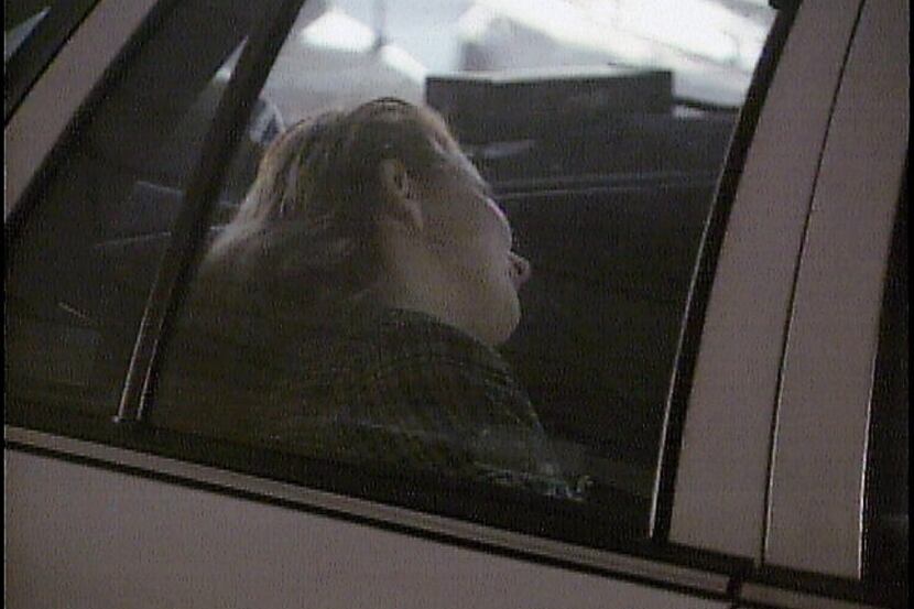 ORG XMIT:  Caption: 2-1-97 Darlie Routier rides in the back seat of a car  after being...