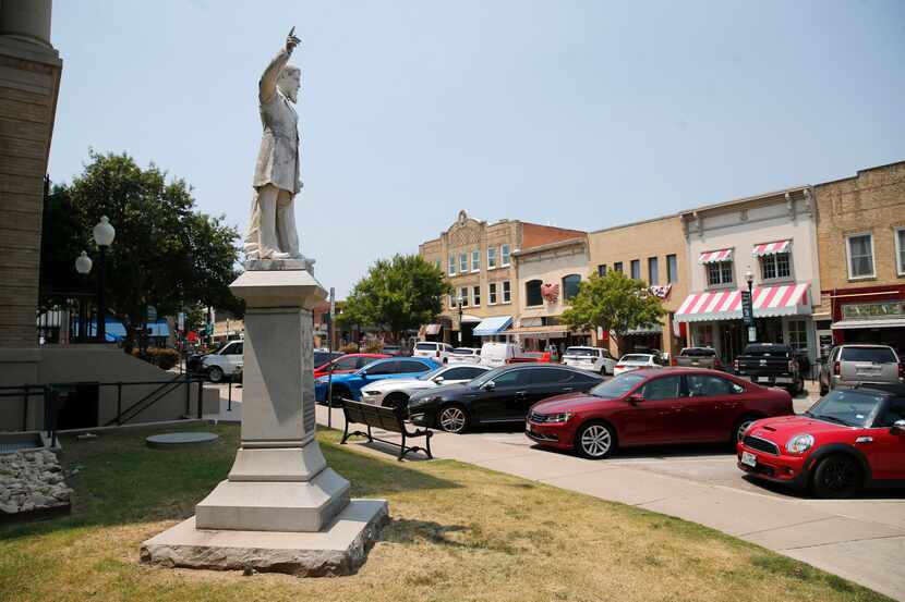 A statue of James W. Throckmorton, a Confederate brigadier general, stands in the McKinney...