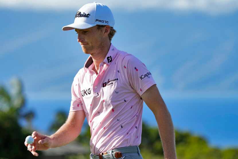 Will Zalatoris acknowledges the gallery on the 14th green during the first round of the...