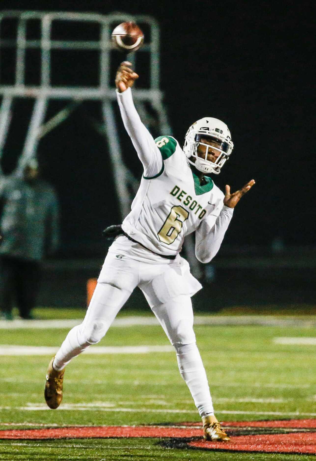 DeSoto quarterback Samari Collier fires off a pass during a high school football match up...