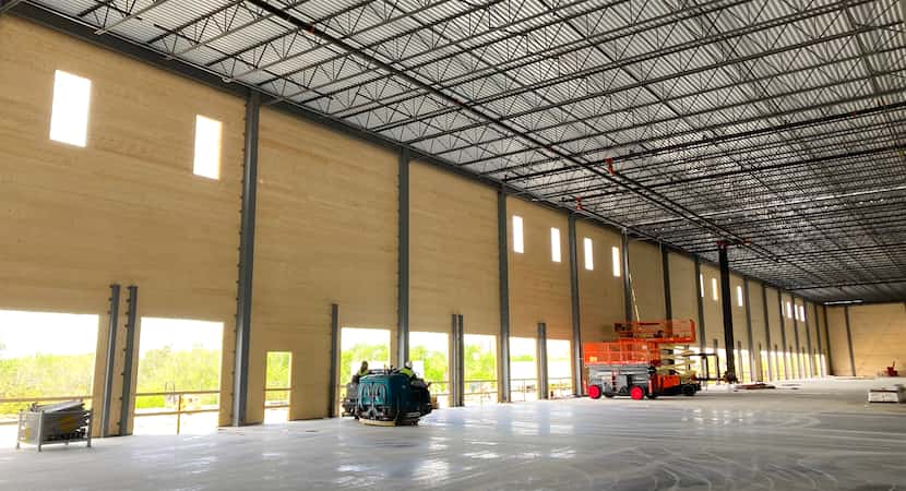 The interior walls of the warehouse will remain as natural wood.