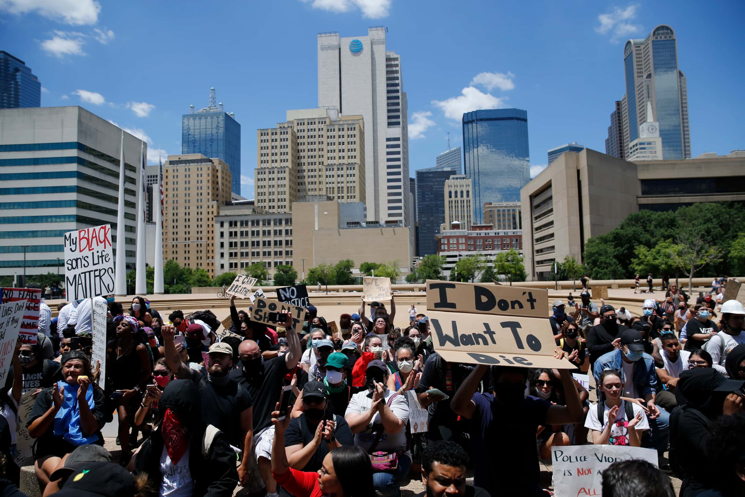 Protesters rally in downtown Dallas during a demonstration against police brutality.