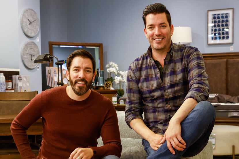 Property Brothers Drew Scott (left) and Jonathan Scott with their home collection at...