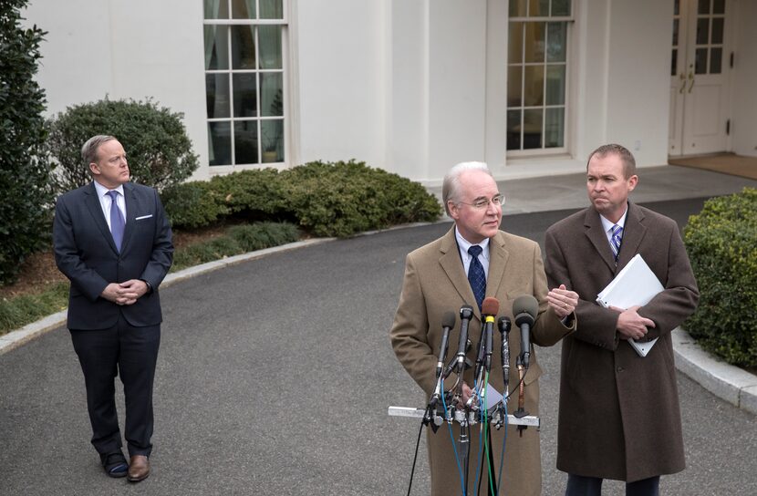 Tom Price, center, Secretary of Health and Human Services, and Mick Mulvaney, director of...