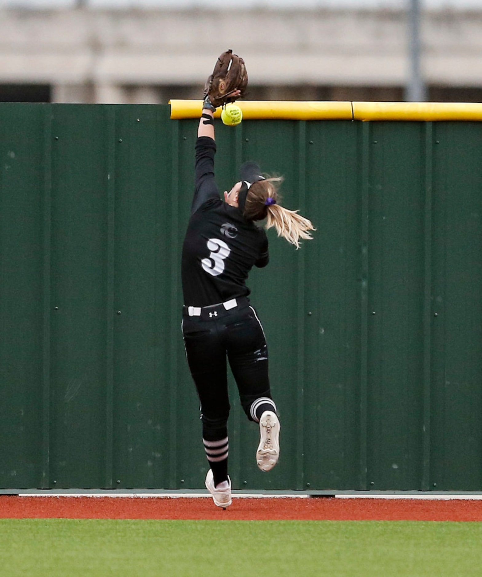 Denton Guyer left fielder Eva Myers is unable to catch a hit for a double by EatonÃs Ashlyn...