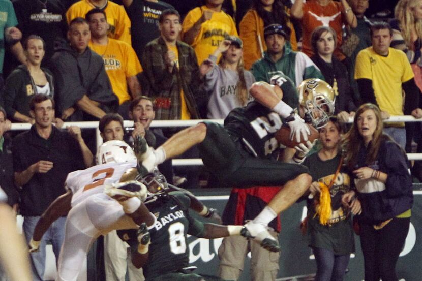 Baylor Bears safety Sam Holl (25) intercepts a ball intended for Texas Longhorns wide...