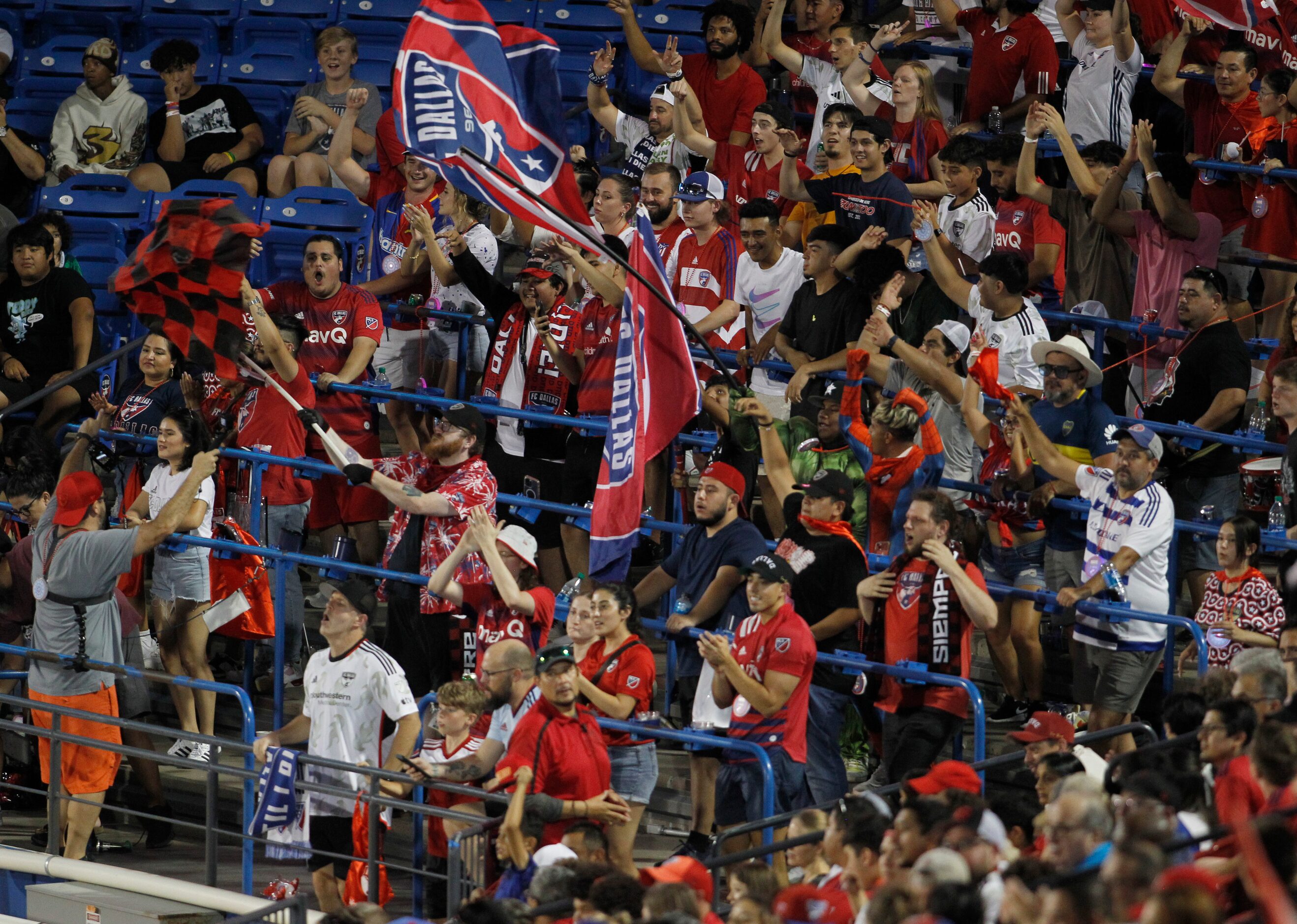 A spirited group of FC Dallas fans cheer their team in the final minutes of their eventual...