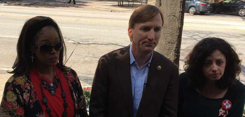 Andrew White spoke to reporters about gun-safety measures in Austin on Monday with Nicole...