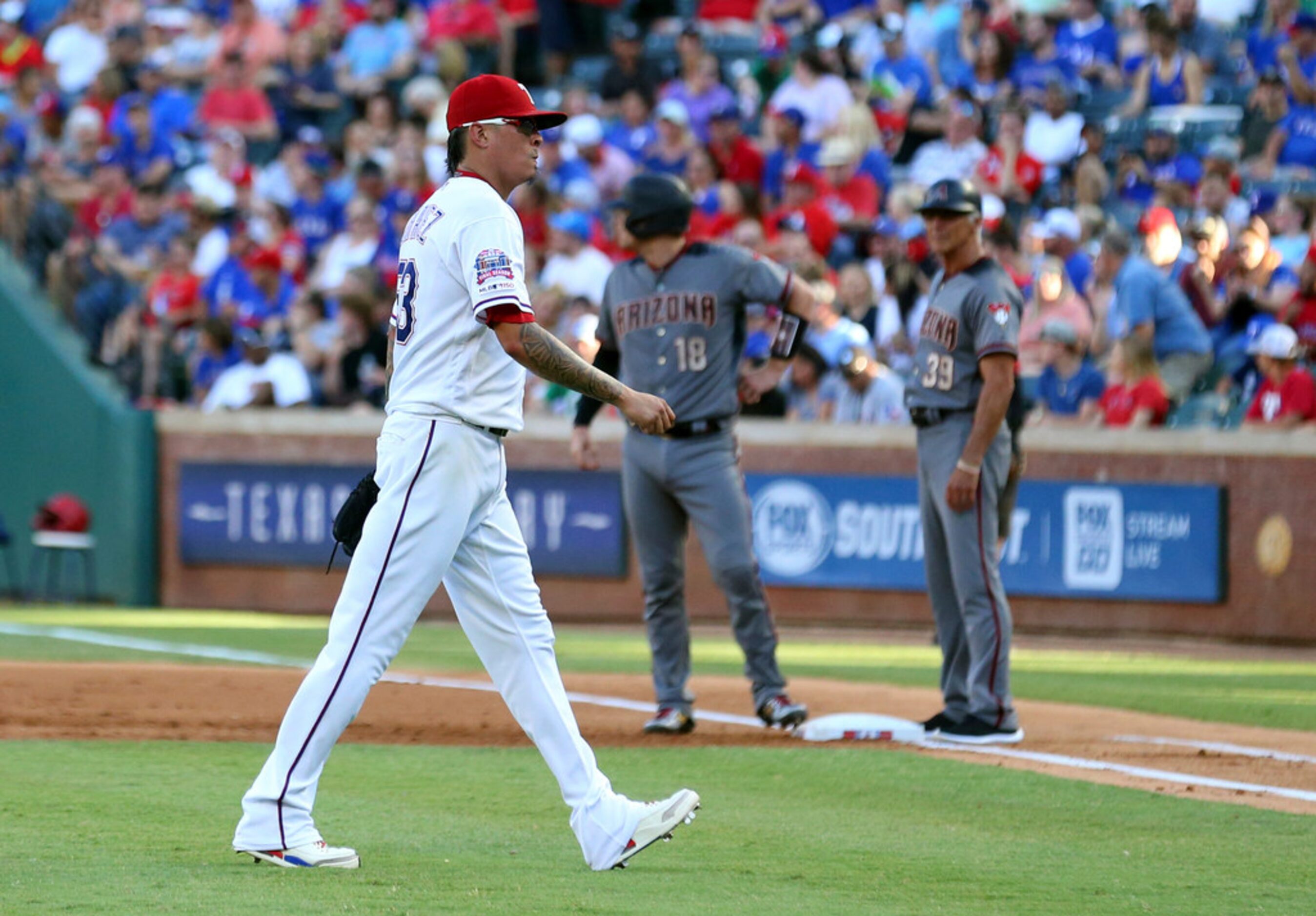 Texas Rangers pitcher Jesse Chavez (53) exits the game after giving up six runs in the first...