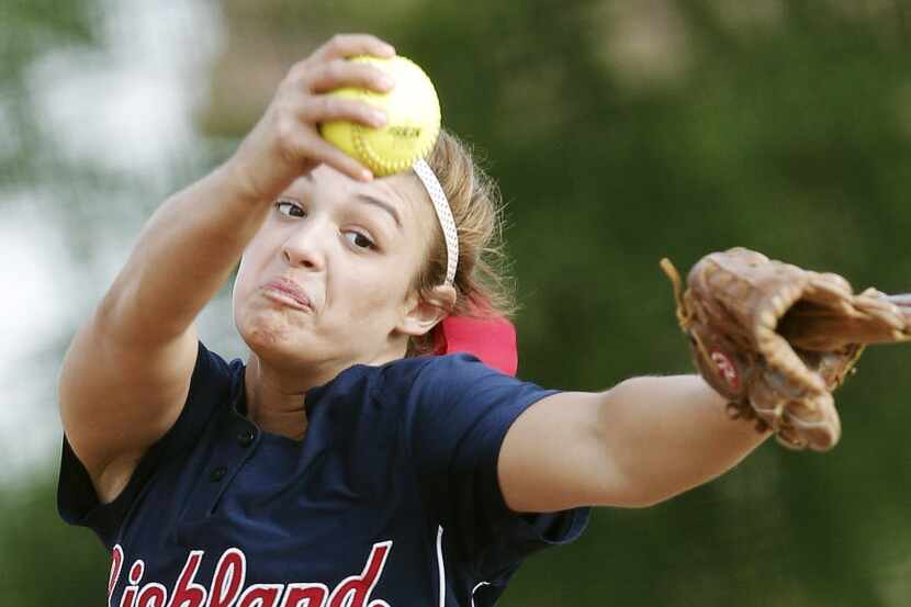 Richland's Haley Freyman (11) throws during a high school softball game against Keller at...