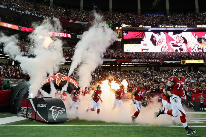 ATLANTA, GA - JANUARY 14:  The Atlanta Falcons take the field against the Seattle Seahawks...
