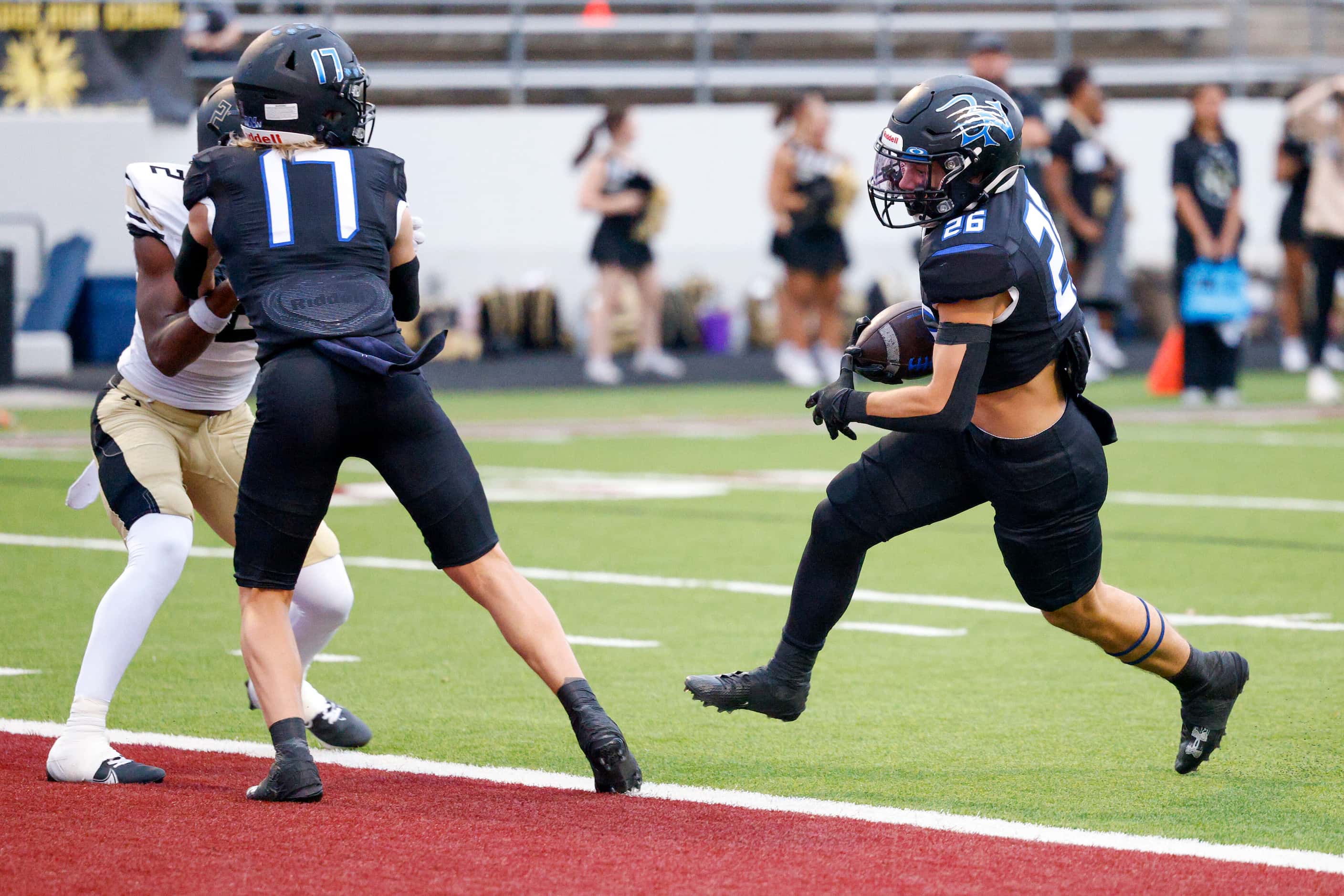 Trophy Club Byron Nelson running back Tucker James (26) runs into the end zone for a...