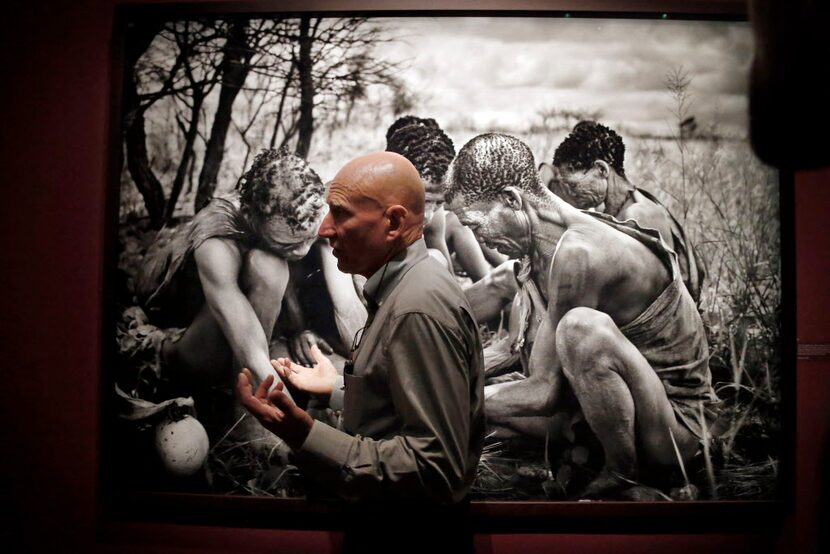 Brazilian photographer Sebastiao Salgado leads a tour of his exhibition "Genesis" on...