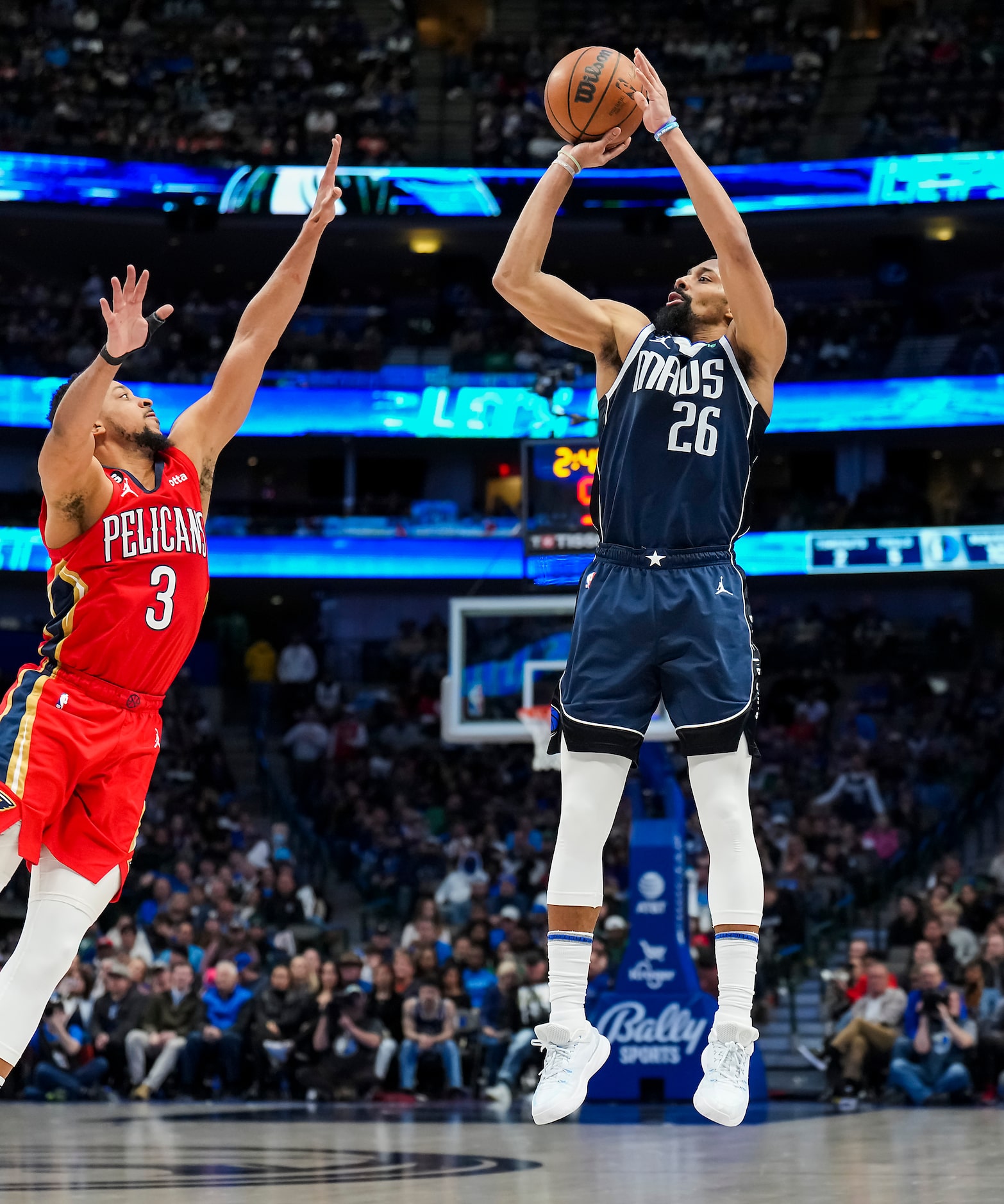 Dallas Mavericks guard Spencer Dinwiddie (26) shoots over New Orleans Pelicans guard CJ...