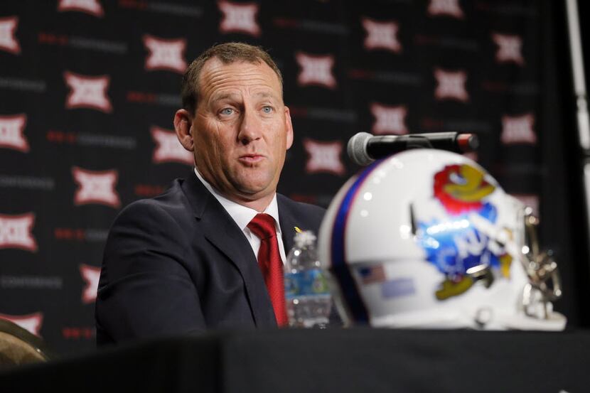 Kansas head football coach David Beaty responds to questions during Big 12 media days,...