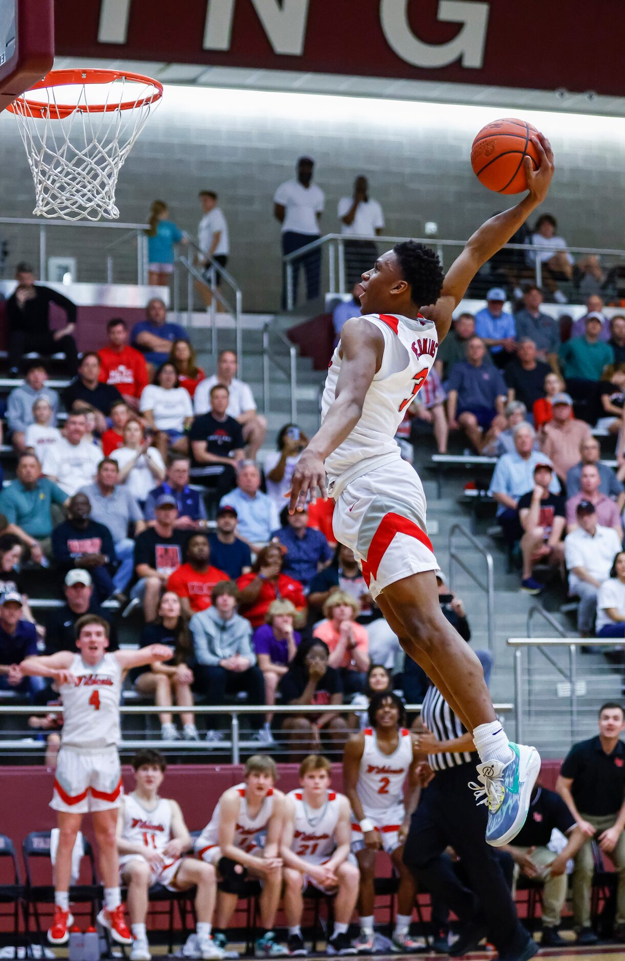 Lake Highlands senior guard Quinton Perkins dunks on a breakaway during a Class 6A...