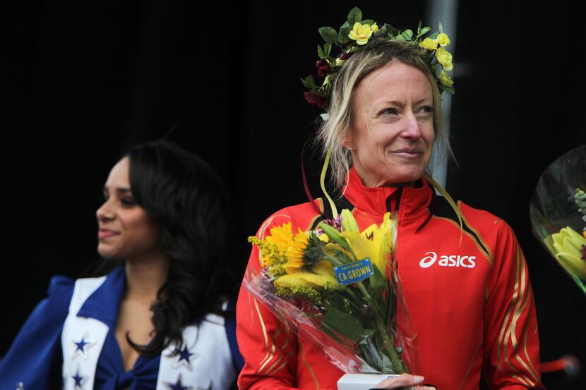 Olympic medal winner Deena Kastor, who finished first in the women's division with a time of...