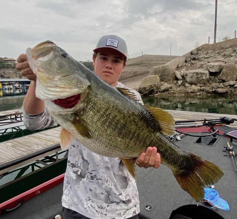 Trace Jansen of Buda caught his whopper 15.32-pounder off a spawning bed in three feet of...